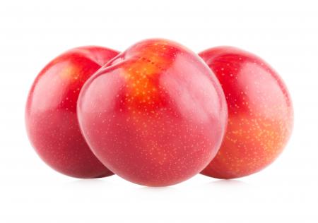 Plums isolated on white background