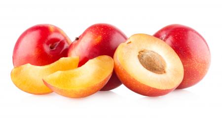 Plums isolated on white background