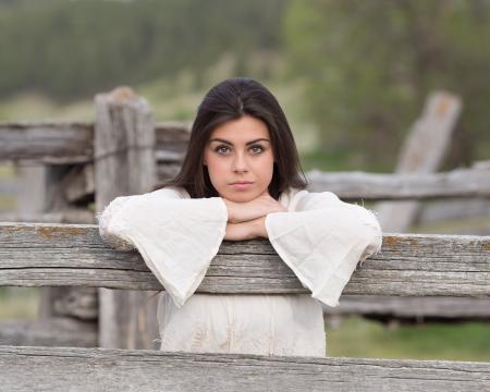 Portrait of Beautiful Woman in Park