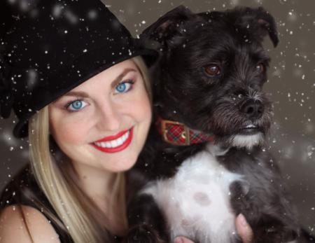 Portrait of Smiling Woman With Dog in Winter