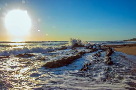 Portrait Photography of Seashore and Sun