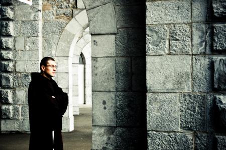 Priest standing in church