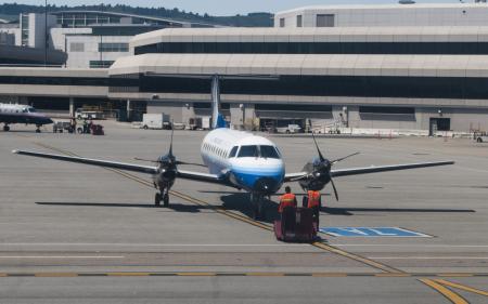 Propeller plane on runway at SFO