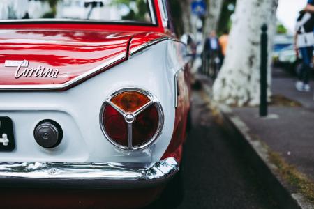 Rear of Red and White Ford Cortina