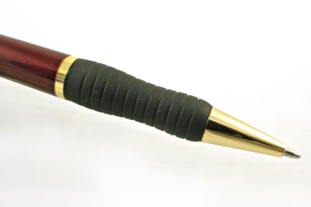 Red and golden pen closeup