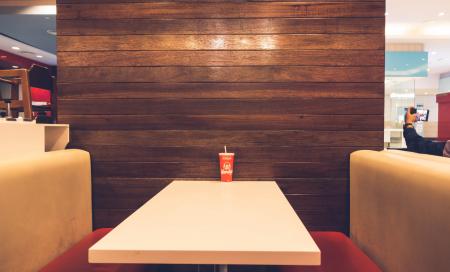 Red Disposable Cup on White Table