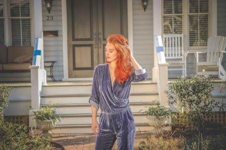 Red Haired Woman Wearing Blue Long-sleeve Jumpsuit