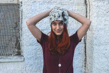 Red Haired Woman Wearing Purple T-shirt