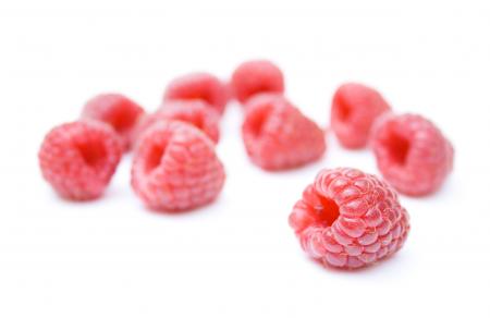 Red ripe berry raspberry isolated on whi