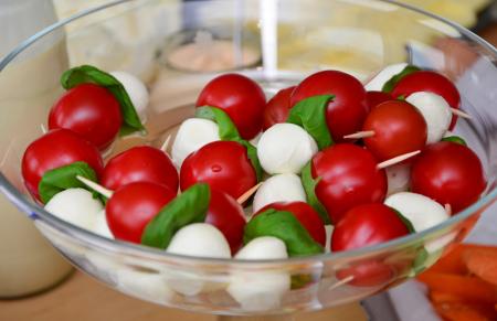 Red Round Fruit Served on Clear Glass Bowl