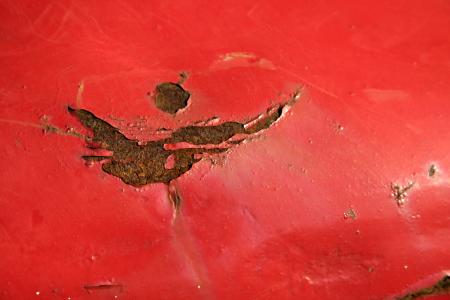 Red rusted metal plate