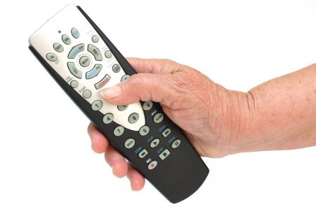 remote control in hand isolated