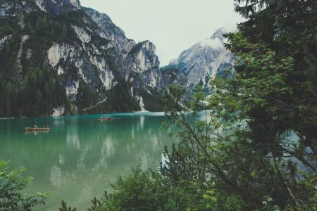 River Surrounded by Mountains during Daytime