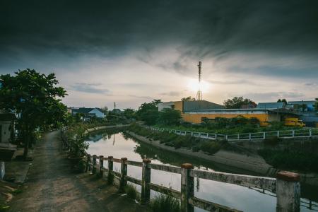 Road Beside Calm Body of Water