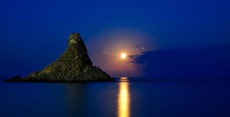 Rock Formation on Sea during Dawn