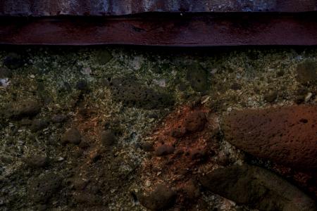 Rust stained concrete wall