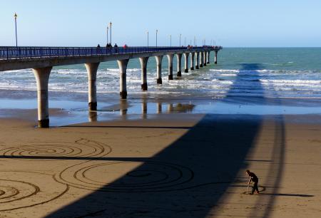 Sand artist. New Brighton Pier.
