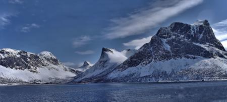 Scenic View of Lake Against Mountain Range