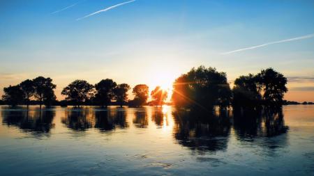 Scenic View of Lake Against Sky during Sunset