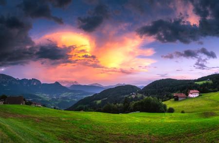 Scenic View of Landscape Against Cloudy Sky