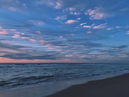 Scenic View of Ocean During Dawn