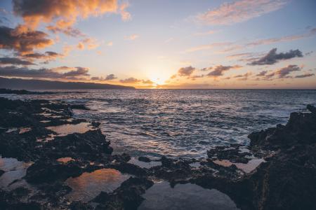 Scenic View of Ocean During Sunset