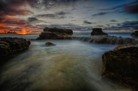 Scenic View of Ocean During Sunset