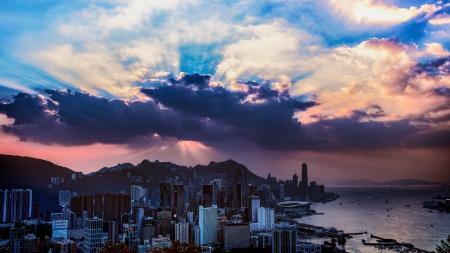 Scenic View of the City Under Cloudy Sky