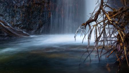 Scenic View of Waterfall during Winter