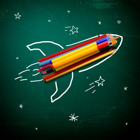 School stationery on a rocket - School and learning concept