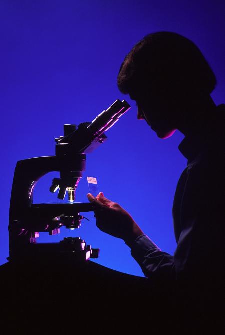 Scientist with Microscope