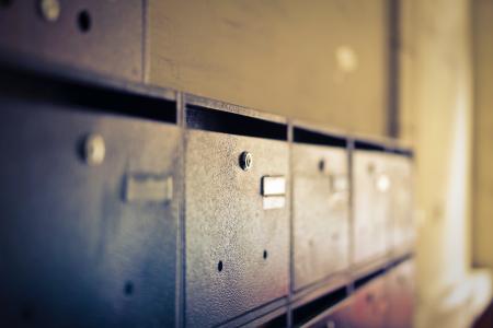 Selective Focus Photo of Black Wooden Drawers