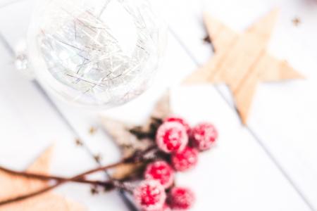 Selective Focus Photo of Clear Bauble Seeing Red Mistletoe