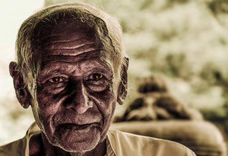 Selective Focus Photo of Man in White Collared Shirt
