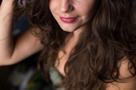 Selective Focus Photography of a Smiling Woman