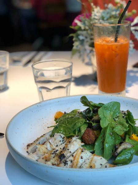 Selective Focus Photography of Cooked Food With Vegetables in Plate Near Glass of Water