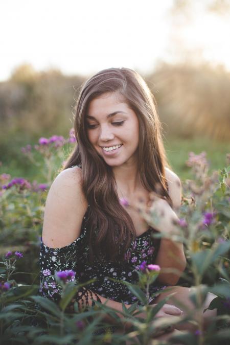 Selective Focus Woman Surrounded by Flower