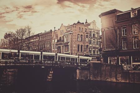 Sepia Photography of Bridge and Concrete House