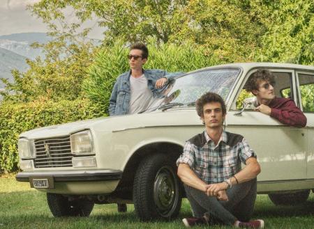 Shallow Focus Photography of Three Men With White Car Surrounded of Trees