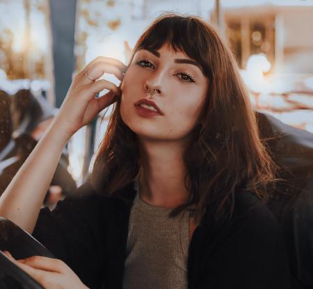 Shallow Focus Photography of Woman in Gray Top