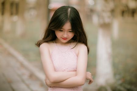 Shallow Focus Photography of Woman in Pink Dress