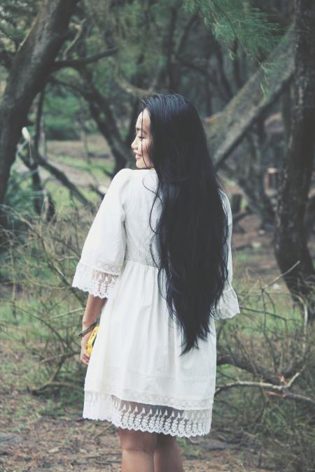 Shallow Focus Photography of Woman in White Mini Dress Near Tress