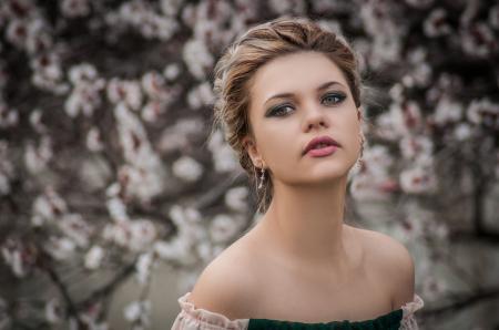 Shallow Focus Photography of Woman Near Cherry Blossom Tree