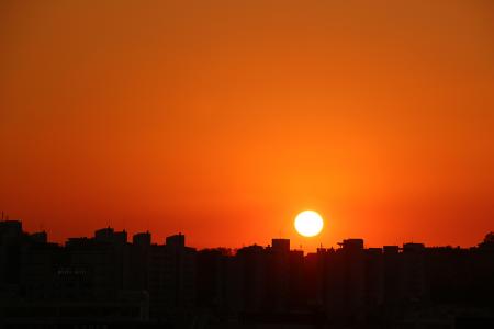 Silhouette Cityscape Against Romantic Sky at Sunset