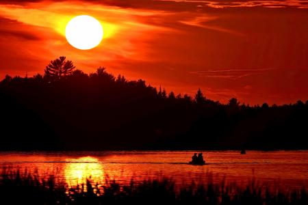 Silhouette of Mountain Beside Body of Water