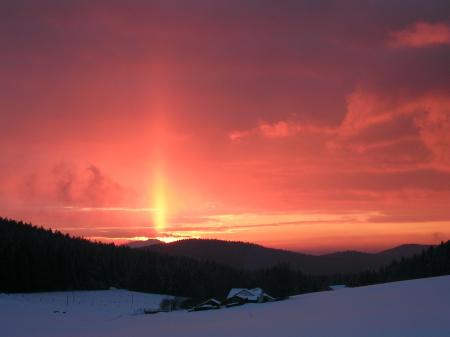 Silhouette of Mountains Under Sunset