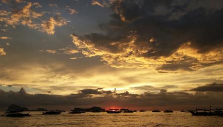 Silhouette of Ships during Sunset