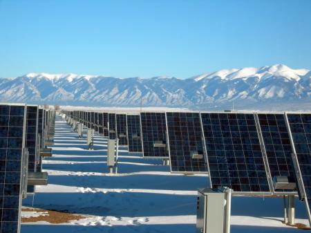 Silver and Black Solar Panels on Snow Covered Ground