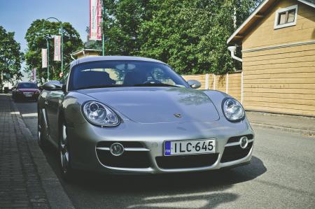 Silver Car Parked Near Wooden House