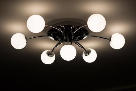 Silver Flush Mount Ceiling Light With Seven White Globe Lights